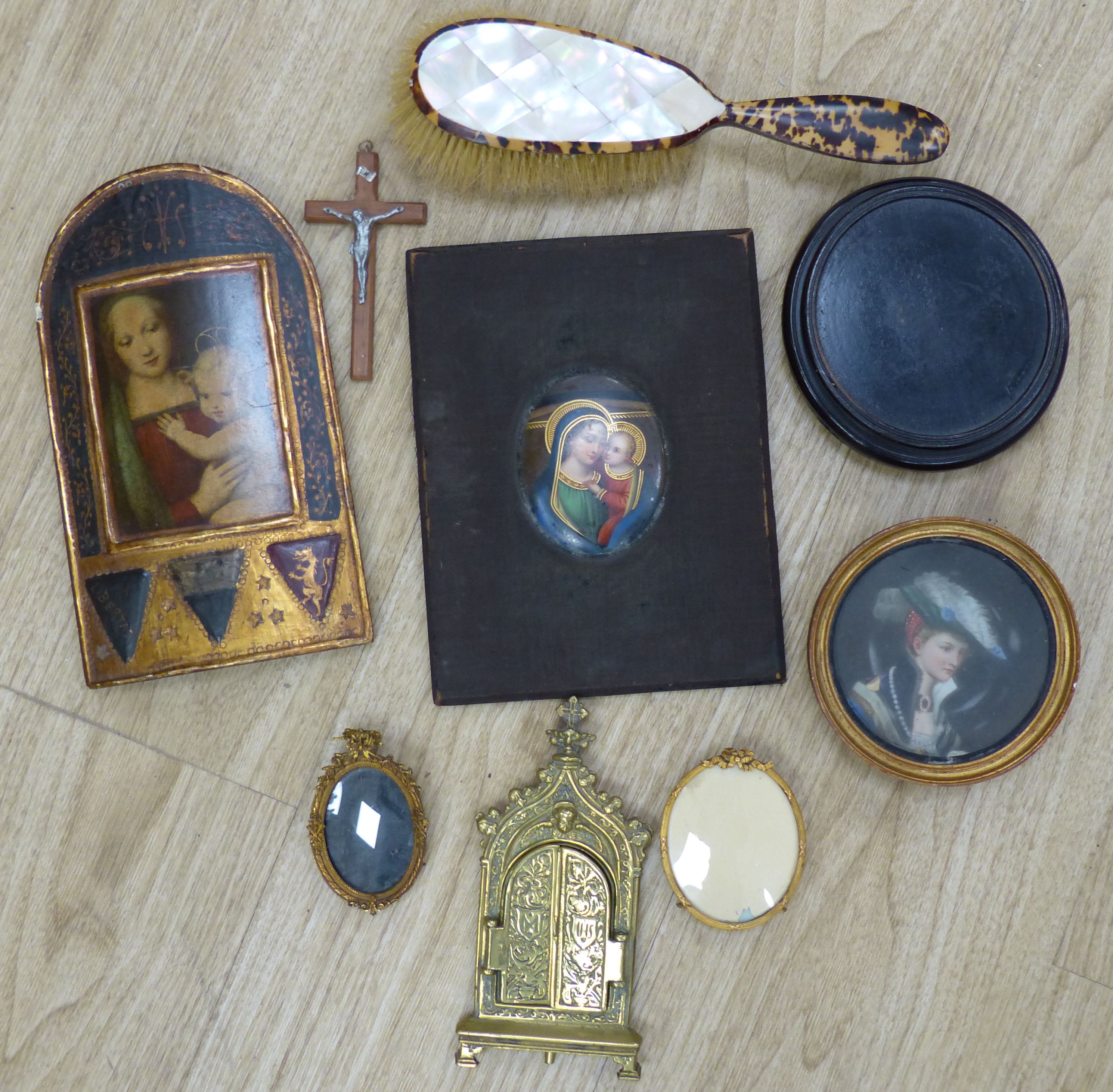 A quantity of mixed collectables to include a mother of pearl and faux tortoiseshell brush, a hardwood stand, an oval frame, a crucifix